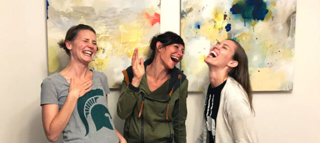 Mom-friends-laughing-together-mom-groups-Lansing-1