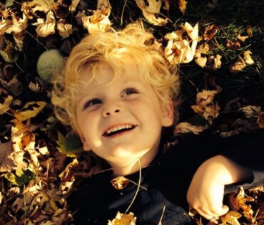 Boy in Leaves, Fall, Lansing