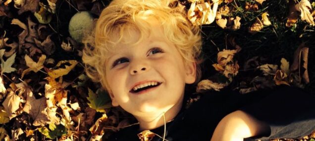 Boy in Leaves, Fall, Lansing