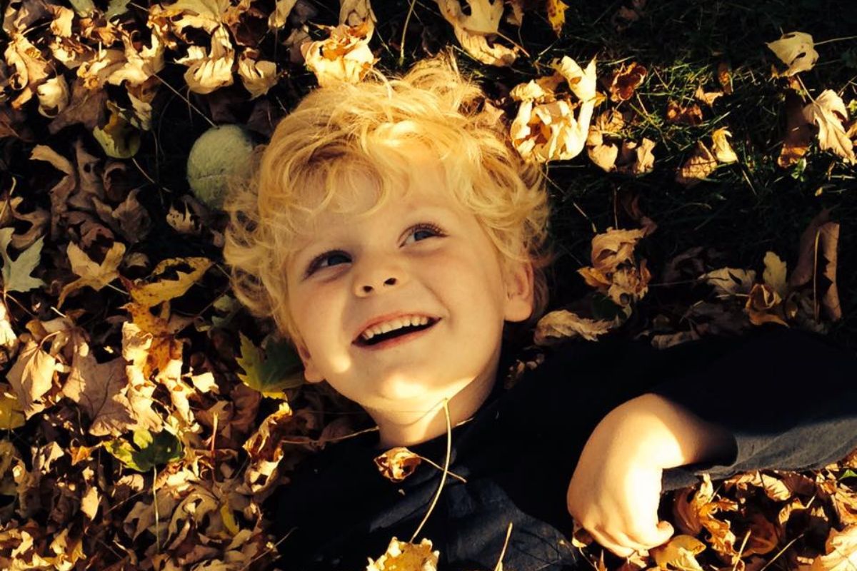 Boy in Leaves, Fall, Lansing