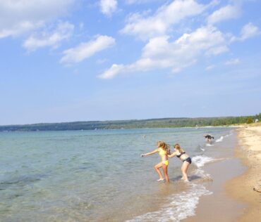 https://grkids.com/wp-content/uploads/2022/05/Beach-at-Petoskey-State-park-in-Petoskey-Michigan.jpg