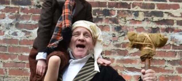 Holly Dickens Festival scrooge and tiny tim