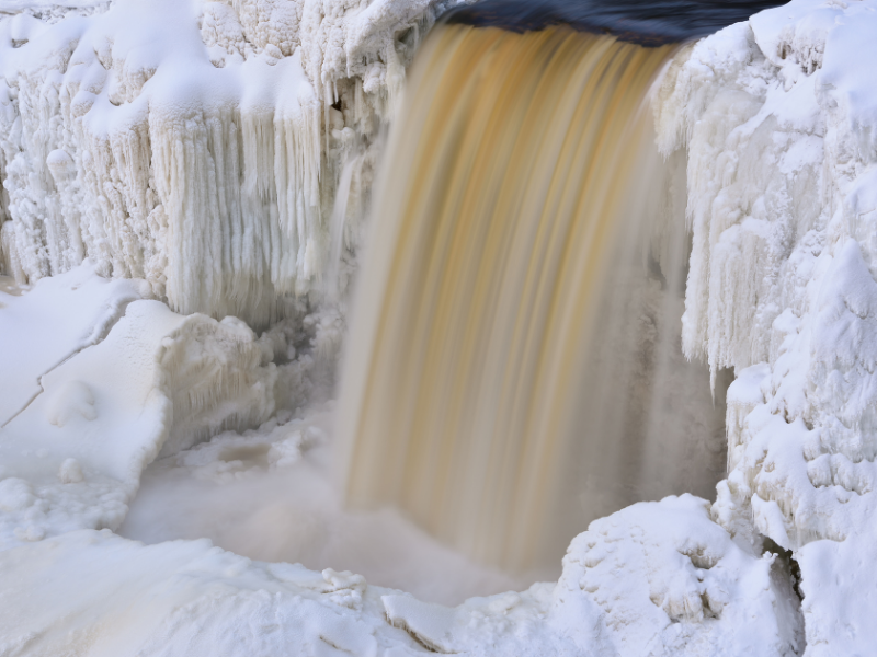 Winter, Upper Tahquamenon Falls dpenn - Getty - Canva
