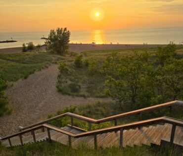 New Buffalo Sunset Over Lake With Stairs Leading Down Ver