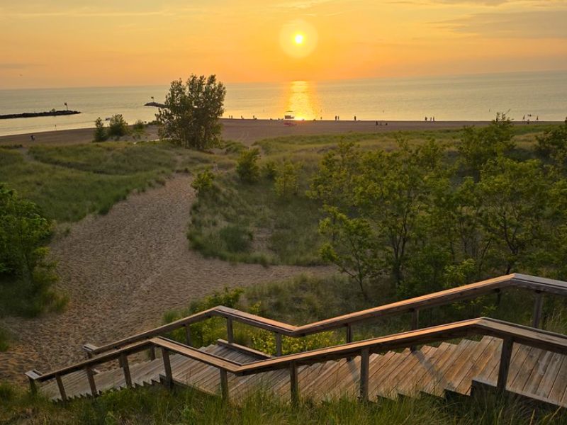 New Buffalo Sunset Over Lake With Stairs Leading Down Ver